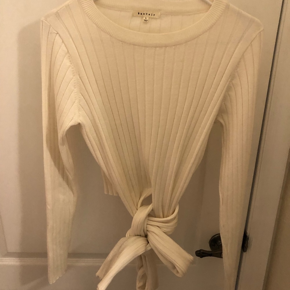 Wrap around crop top sweater.